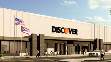 A rendering of a building with Discover Financial Services' logo on it. the rendering features a blue, cloud-filled sky, people milling about, and flags at the entrance. This will be the future home of Discover's Whitehall Center.