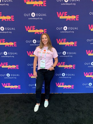 Ashley, a woman in a pink shirt